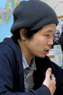 Kenta Oshikiri speaking during a 2009 interview